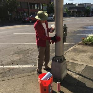 Lee cleaning grafitti off light poles Lee cleaning grafitti off light poles
